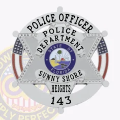 Silver 6 point star badge surrounded by a circular banner for sunny shore heights police officer force, featuring bold black text “police officer” on top, central florida state emblem inside the star, text banners showing department and location, and badge number 143 below, with a safety pin attachment.