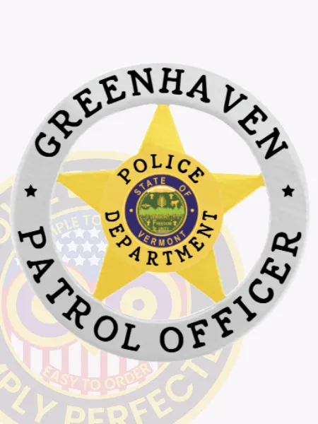 Featuring a custom gold 5-point star metal badge, this image shows it set in a silver circle banner that reads "GREENHAVEN POLICE PATROL OFFICER." The center of the badge showcases the Vermont state seal, representing law enforcement pride. A safety pin attachment allows for secure wear by Greenhaven police patrol officers.