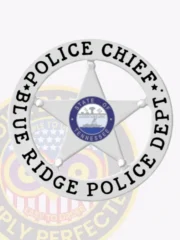This image features a beautifully crafted silver metal badge with a distinctive 5 pointed star in the center, enclosed by a circular banner that reads "POLICE CHIEF" at the top and "BLUE RIDGE POLICE DEPT" below. The central portion showcases the Tennessee state seal, highlighting its law enforcement importance. This custom badge is designed for the Blue Ridge Police chief and includes a practical safety pin attachment.