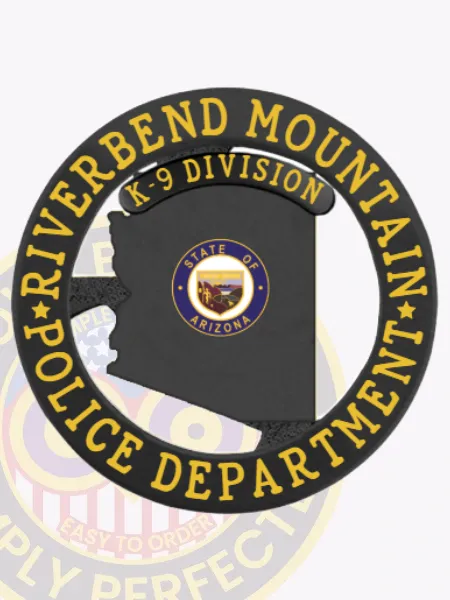 This image showcases a custom Arizona metal badge designed for the Riverbend Mountain police K-9 Division. The badge prominently displays a black outline of Arizona in the center, surrounded by a circular yellow banner with the text "RIVERBEND MOUNTAIN POLICE DEPARTMENT" and "K-9 DIVISION." The safety pin attachment allows for easy fastening.