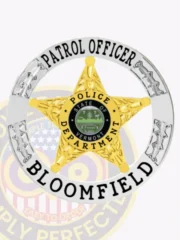 This image presents a custom 5-point gold star metal badge designed for Bloomfield police patrol officers, featuring an elegantly designed gold star surrounded by a silver circular banner. The badge displays "PATROL OFFICER" at the top, "BLOOMFIELD" at the bottom, and "POLICE DEPARTMENT" in the center. A safety pin on the back provides reliable attachment for uniforms.