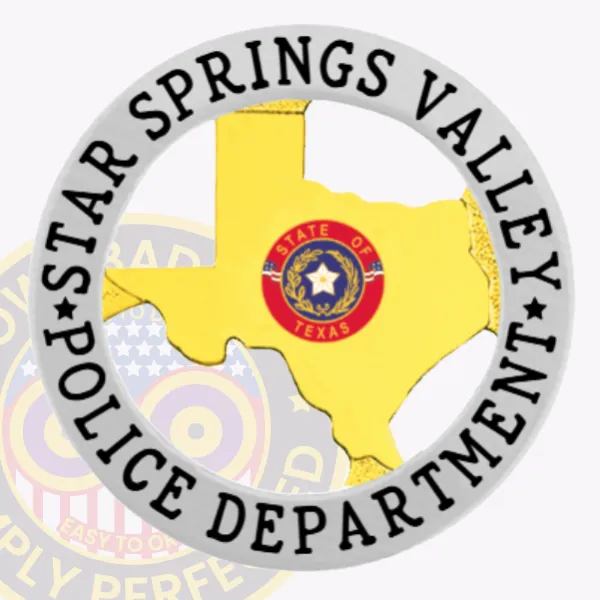 This custom Texas metal badge represents the Star Springs Valley police, displaying a distinctive gold outline of Texas in the center. The badge is framed by a silver circular banner inscribed with "STAR SPRINGS VALLEY POLICE DEPARTMENT." A safety pin on the back ensures simple and secure attachment to uniforms.