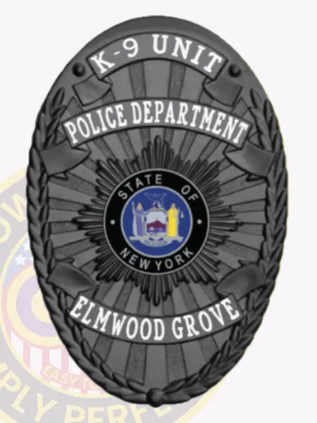 A sleek custom metal badge in black highlights "K-9 UNIT" at the top in striking white text, enhancing visibility. The center showcases an emblem representing the "STATE OF NEW YORK," flanked by decorative accents, with "POLICE DEPARTMENT" and "ELMWOOD GROVE" elegantly arranged beneath. The safety pin attachment provides practical and reliable fastening.