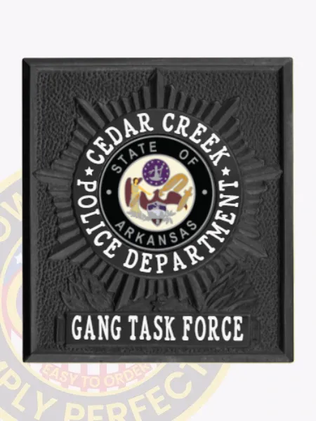 Square black flex badge for Cedar Creek police gang task force, displaying a starburst pattern behind the Arkansas state seal in the center, encircled by "CEDAR CREEK POLICE DEPARTMENT" in white letters, with "GANG TASK FORCE" printed prominently on a black panel below, secured by velcro.