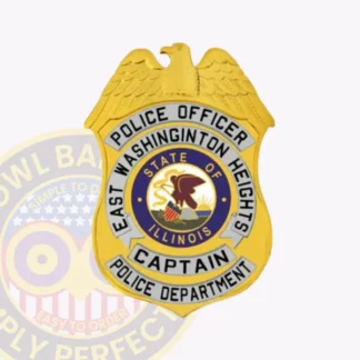 Police officer badge for East Washington Heights featuring a gold shield with a raised eagle design at the top, silver arced banners with bold black text naming the rank as “CAPTAIN” and department details, surrounding the colorful Illinois state seal, fixed with a metal safety pin.