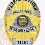Classic Oval Shield Badge with Sunburst Background, Floral Center, 4 Ribbon panels, Braided Border view 2