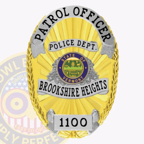 A striking custom metal badge in gold with silver panels and a safety pin attachment, featuring "POLICE DEPT." elegantly inscribed at the top. The badge includes "BROOKSHIRE HEIGHTS" across the center, showcasing the state seal of Vermont and highlighting its polished finish and detailed craftsmanship for law enforcement professionals.