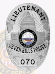 Featuring a custom metal badge in silver, this design highlights "LIEUTENANT" at the top in clear lettering. The central area includes an image of the state capitol building, surrounded by the circular emblem stating "STATE OF NEW HAMPSHIRE." The badge also displays "SEVEN HILLS POLICE" and "070," and it has a safety pin attachment for secure wear.