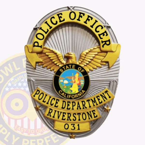A striking custom metal badge in silver accented with gold features a safety pin attachment for secure wearing. The badge displays "POLICE OFFICER" at the top in eye-catching font, accompanied by detailed wing motifs. The center showcases a circular representation of California’s state seal, framed by "POLICE DEPARTMENT RIVERSTONE" and the unique number "031."