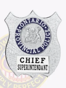 Ontario provincial police silver metal shield badge with the provincial emblem inside a blue ring at the top and “chief superintendant” printed in black on a white plate below, designed with safety pin attachment.