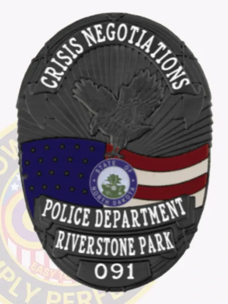 Featuring a custom metal badge in black, this design prominently displays "CRISIS NEGOTIATIONS" in bright white letters at the top. The centerpiece includes an eagle emblem with the flags of South Dakota and the U.S., accompanied by "POLICE DEPARTMENT," "RIVERSTONE PARK," and the number "091." The safety pin attachment ensures it stays securely in place during wear.