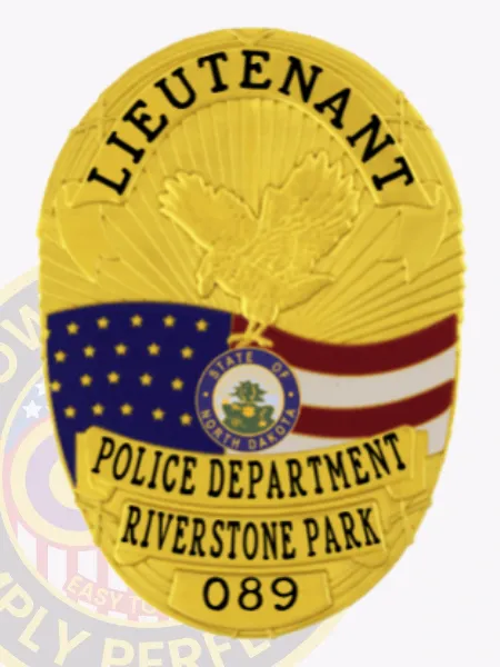 A polished custom metal badge in gold highlights "LIEUTENANT" at the top in contrasting black text, enhancing visibility. The center features a detailed eagle design alongside the flags of South Dakota and the U.S., with "POLICE DEPARTMENT," "RIVERSTONE PARK," and "089" elegantly arranged below. The safety pin attachment provides practical and reliable fastening.