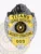 This detailed badge for armed security is crafted in silver with stylish gold panels. The bear emblem at the top lends an authoritative look, while "Titans Armed Security" is displayed prominently in gold lettering. The Texas state seal occupies the center, encircled by decorative elements, and "Security Operations" is clearly indicated below. The badge is marked "005" at the base and features a practical safety pin attachment for secure wear.