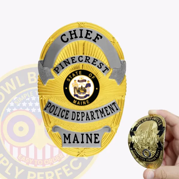 Oval gold flex badge designed for Pinecrest Police chief with velcro attachment, showing a radiant gold surface with embossed lines, silver scrolls displaying bold black lettering for "CHIEF," "PINECREST," "POLICE DEPARTMENT," and "MAINE," with the Maine state emblem in the center.