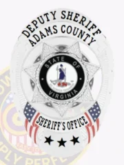 An elegant silver custom metal badge for deputy sheriffs, featuring a star-shaped design with "DEPUTY SHERIFF ADAMS COUNTY" prominently displayed at the top. In the middle, a circular emblem showcases “STATE OF VIRGINIA,” encircled by “SHERIFF’S OFFICE.” The badge is enhanced with three stars at the bottom and has a practical safety pin attachment for convenience.