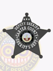 This custom metal badge for deputy sheriffs gleams in black and features a striking star shape. The top inscription reads "DEPUTY SHERIFF," while the center holds a circular emblem stating “STATE OF KENTUCKY” and "CARTER COUNTY SHERIFF'S DEPT." The badge is complemented by decorative stars and includes a safety pin attachment for secure placement.