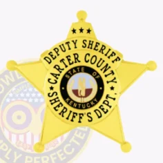 This custom metal badge for deputy sheriffs shines in gold, designed in a star shape. The top features the text "deputy sheriff," while the center highlights a circular emblem stating “state of kentucky” and "carter county sheriff's dept. " the badge includes a safety pin attachment for practical and convenient fastening.