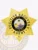 Custom gold 7 point metal badge for fugitive recovery agents in Florida with safety pin attachment featuring an intricate embossed star design and a central circular emblem displaying the Florida state seal with a palm tree, sun, water, and a steamboat, encircled by bold black text reading FUGITIVE RECOVERY AGENT, and FL engraved at the bottom point