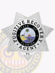 Metal badge in a silver 7-point star shape for fugitive recovery agents in Florida, showcasing bold black text "FUGITIVE RECOVERY AGENT" surrounding the official state seal, with detailed embossing and a safety pin attachment.