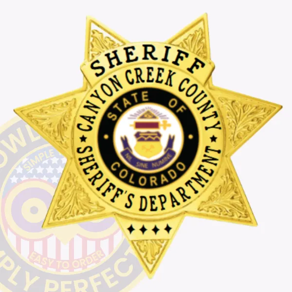 A polished custom 7 point star metal badge for sheriff departments, radiating in gold. The badge prominently displays "SHERIFF" at the top, with "CANYON CREEK COUNTY" encircling a circular emblem featuring the state's seal. Designed with a safety pin attachment, it ensures easy and reliable fastening to uniforms.