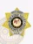 A custom metal badge for deputy sheriffs, this design showcases a sophisticated gold 7-point star with silver panels and intricate detailing. The inscription "BLUE RIDGE VALLEY SHERIFF'S OFFICE" encircles the central emblem showcasing New Mexico, while "DEPUTY SHERIFF" is displayed prominently at the top. A safety pin attachment allows for easy and secure wearing.