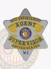 Metal badge in silver with gold panel accents shaped like a 6 point star, featuring blue lettering that reads “BAIL ENFORCEMENT AGENT SUPERVISOR UNITED STATES,” plus the Wisconsin state seal at center, designed for bail enforcement agents with safety pin attachment.
