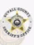 A striking silver custom metal badge for deputy sheriffs, featuring a prominent gold star at the center. The top inscription reads "DEPUTY SHERIFF," while the circular outer edge states "DUVALL COUNTY SHERIFF'S OFFICE." In the center, the badge displays “STATE OF WEST VIRGINIA” along with a detailed emblem. This badge includes a safety pin attachment for secure wear.