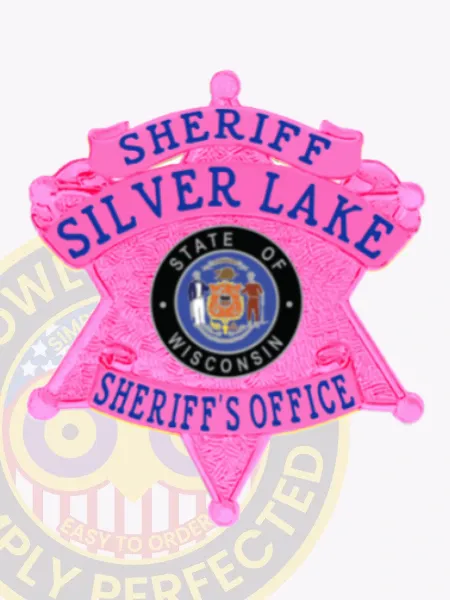An eye-catching custom 6 point star metal badge for sheriff departments in a bold BCAM pink finish. The design showcases "SHERIFF" prominently at the top, while "SILVER LAKE" curves over a detailed central emblem representing Wisconsin’s state insignia. This badge includes a safety pin attachment for reliable and convenient wear.