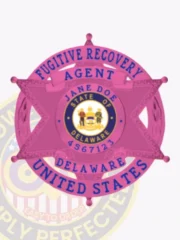Delaware fugitive recovery agent badge in bright BCAM pink featuring a 6-point star inside a circular banner, including blue text "FUGITIVE RECOVERY AGENT UNITED STATES," the official Delaware state seal at the center, personalized "JANE DOE 4567123," with a safety pin attachment for easy wear.