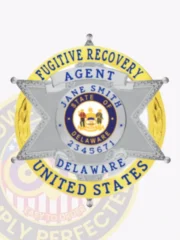 Silver metal 6-point star badge enclosed in a gold circular banner for Delaware fugitive recovery agents, displaying blue lettering "FUGITIVE RECOVERY AGENT UNITED STATES" around the edge, the Delaware state seal centered inside the star, personalized "JANE SMITH 2345671," with a safety pin fastener.