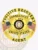 Polished gold metal badge featuring a 6-point star within a circular banner for fugitive recovery agents in Connecticut, with bold black text encircling the badge reading "FUGITIVE RECOVERY AGENT UNITED STATES," the state seal in the middle, personalized "J. DOE 123456," and American flags flanking the star, attached via safety pin.
