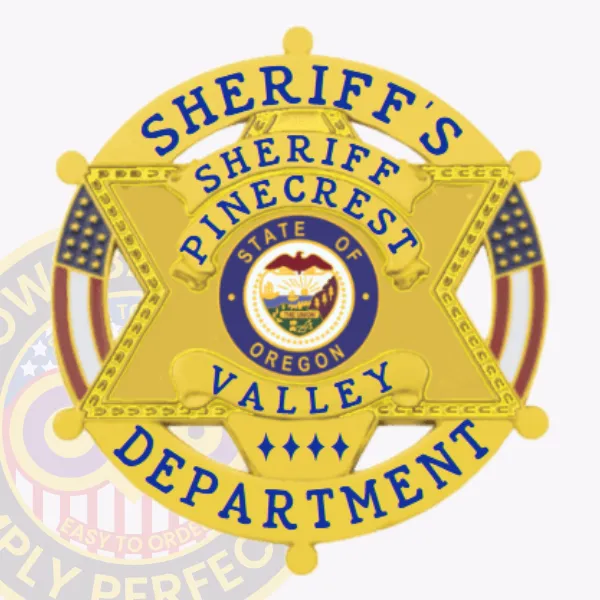 A refined custom 6 point star in a circle banner metal badge for sheriff departments, radiating in gold. The design highlights "SHERIFF'S" prominently at the top, with "PINECREST VALLEY DEPARTMENT" surrounding a detailed central emblem that includes elements of Oregon’s state seal. This badge includes a safety pin attachment for easy application to uniforms.