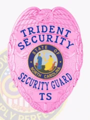 Crafted in an eye-catching BCAM pink color, this custom metal badge for security guard highlights intricate details, including the eagle emblem. The text "TRIDENT SECURITY" is prominently featured at the top, while the state seal of North Carolina and "SECURITY GUARD" are centrally displayed, reflecting pride and authority.