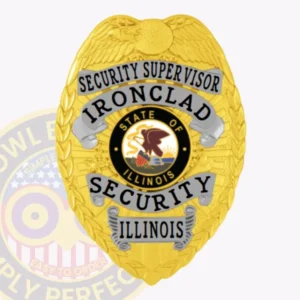 Custom Security Supervisor Badge Eagle Top 2-C13Ssb 1 This beautifully designed custom metal badge for security supervisors features a shiny gold finish with silver panels. The top displays "security supervisor" in bold black letters, while "ironclad" is featured below, surrounding an emblem that represents illinois. The badge includes elegant eagle wings and is secured with a strong safety pin attachment for dependable display.