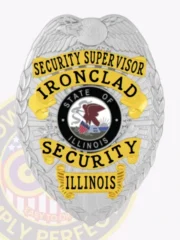 This elegant silver custom metal badge for security supervisors showcases gold panels, prominently displaying "SECURITY SUPERVISOR" at the top in bold black text. Below, "IRONCLAD" is highlighted in gold, surrounding a central emblem depicting Illinois's state seal. The badge features intricate eagle wing designs and is secured with a dependable safety pin attachment to ensure it remains securely in place.