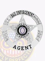 Bail enforcement agent badge in polished silver metal with a five-point star inside a circular banner, labeled “BAIL ENFORCEMENT” at the top arc and “AGENT” at the bottom, featuring the state of Connecticut emblem in the star center, secured with a safety pin.