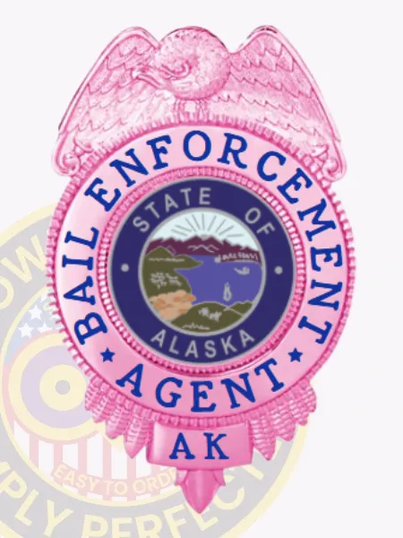 Bail enforcement agent badge in bright BCAM pink metal with a raised eagle on top, blue lettering "Bail Enforcement Agent" surrounding the Alaska state seal, personalized with "AK" at the base, designed with a safety pin attachment for secure wear.