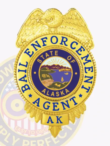 Gold bail enforcement agent badge showcasing a prominent gold eagle at the top, blue lettering circling the Alaska state seal reading "Bail Enforcement Agent," personalized with state initials "AK," and secured using a safety pin.