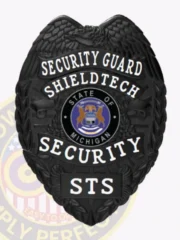 This custom metal badge for security guard features a sleek black finish, accented by bold white lettering. The badge prominently displays "SECURITY GUARD" and "SHIELDTECH" at the top, with the state emblem of Michigan at the center and "SECURITY" clearly marked below, showcasing authority and professionalism.