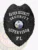 This polished black custom metal badge for security supervisors features "HAVEN SECURITY" boldly displayed at the top in white lettering. Below, "SECURITY SUPERVISOR" and "FL" are featured around a central emblem representing the state of Florida. The badge is adorned with detailed eagle wings and includes a strong safety pin attachment for secure wear.
