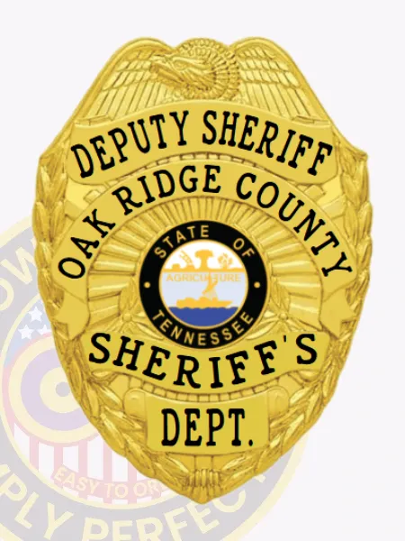 This striking gold custom metal badge for deputy sheriffs showcases "DEPUTY SHERIFF" in bold letters at the top, complemented by an eagle motif. The center features a circular emblem with the Tennessee state seal, surrounded by "OAK RIDGE COUNTY" and "SHERIFF'S DEPT." The badge is designed with a practical safety pin attachment for easy use.
