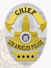 LAPD Chief custom oval metal badge in radiant silver with gold detailing. The text "CHIEF" is boldly displayed in black at the top, framing a detailed illustration of LA City Hall. Below, "LOS ANGELES POLICE" elegantly wraps around, and three gold stars add a touch of distinction at the base. This badge includes a safety pin attachment for secure display.