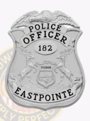 Eastpointe Police Dept. custom silver badge displaying an eagle figure atop a shiny silver shield, bold black lettering for "POLICE OFFICER," the number "182" inside a central oval, and "EASTPOINTE" at the base, designed with a secure safety pin for police officers.