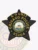 Five-point black star badge labeled K-9 Unit Chicago Police, featuring gold lettering and detailed Chicago city seal in the center, designed with a safety pin fastener