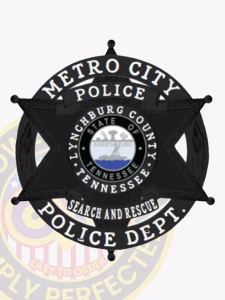 Black six-point star badge with a circular border displaying "METRO CITY POLICE" above and "POLICE DEPT." below, centered on the Lynchburg County Tennessee seal, customized for the Search and Rescue unit with a safety pin attachment.