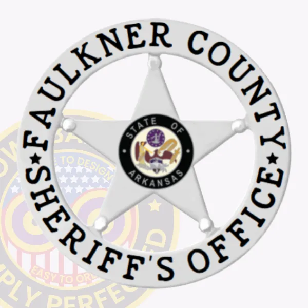 Detailed silver 5 point star metal badge for Faulkner County sheriff’s office, surrounded by a white circular text banner in black and centered State of Arkansas seal, designed for secure safety pin attachment.
