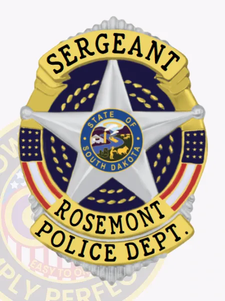 Detailed custom silver shield metal badge for Rosemont police sergeant with safety pin fastener, featuring a central silver five-point star with the South Dakota seal in the middle, gold banners at the top and bottom reading SERGEANT and ROSEMONT POLICE DEPT., and American flag colors on the sides.