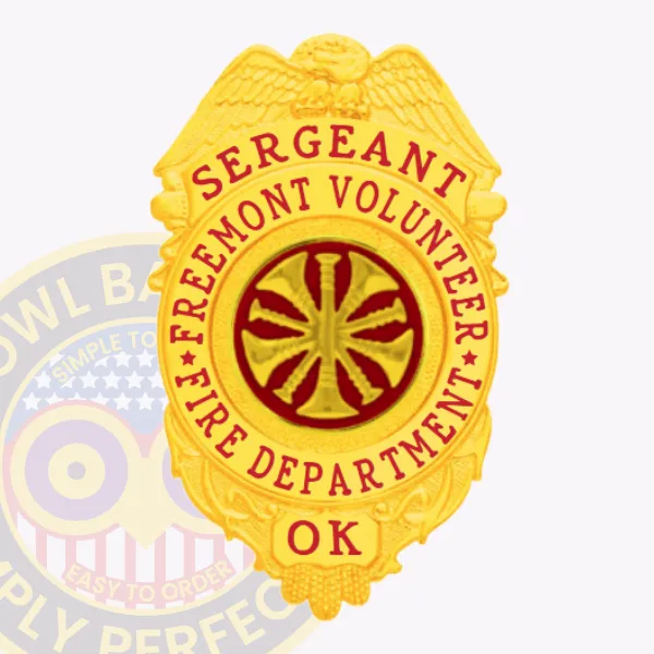 Custom gold eagle top metal badge for Freemont volunteer fire department sergeant, red lettering on gold background encircling a red center with a gold fire horn icon, created with a safety pin backing for easy use.