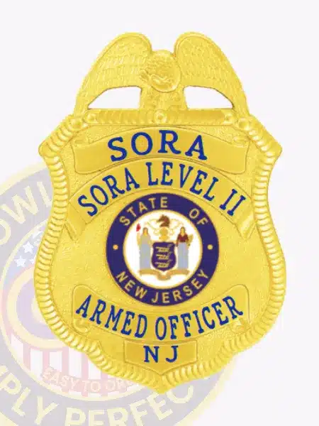 Photo showcasing a custom gold eagle top metal badge for SORA Level 2 with safety pin attachment; the badge has a gleaming gold finish with an eagle figure on top, vivid blue text, and the official New Jersey state insignia clearly displayed in the middle.