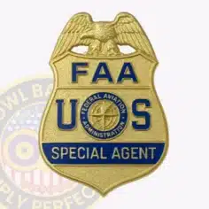 Alt text: a custom gold eagle top metal badge for faa, the special agent with safety pin attachment, designed as a sturdy gold shield with detailed eagle wings spread at the top and clear blue lettering including "faa u s," the faa seal, and "special agent" on a blue background.